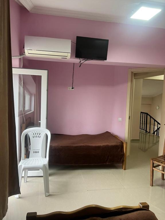 Postel nebo postele na pokoji v ubytování Hotel Lotus