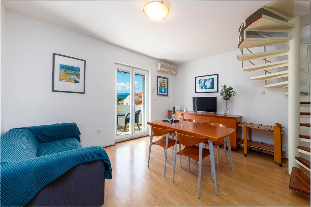 Televízia a/alebo spoločenská miestnosť v ubytovaní Apartment Soulmate