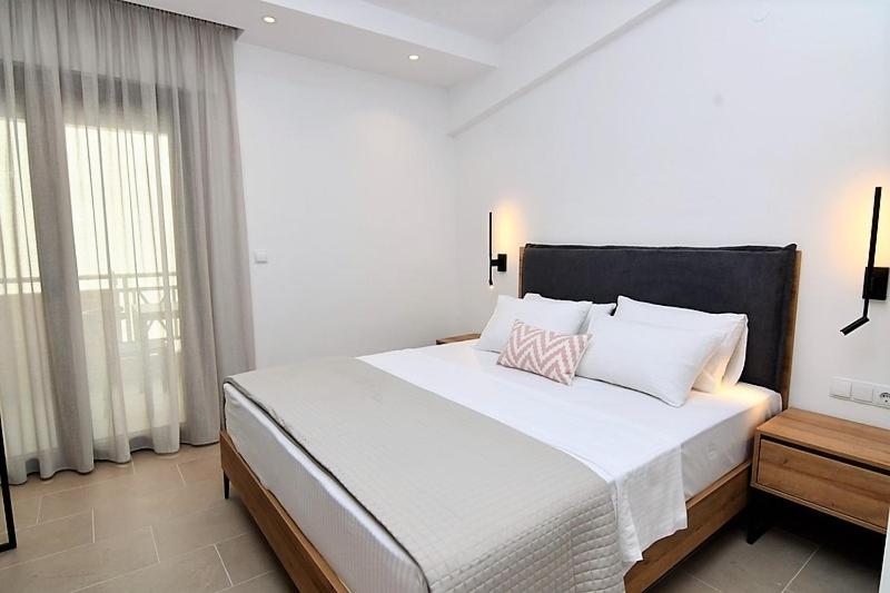 Posteľ alebo postele v izbe v ubytovaní Villa Foni