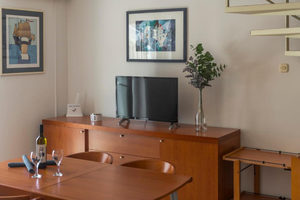 Televízia a/alebo spoločenská miestnosť v ubytovaní Apartment Soulmate