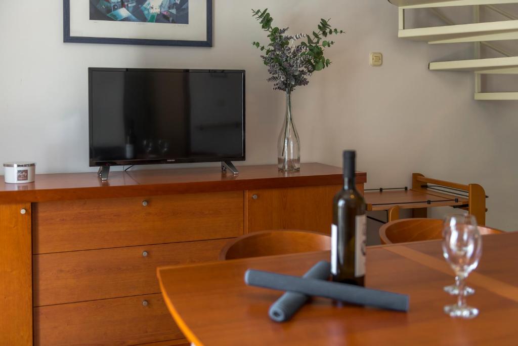 Televízia a/alebo spoločenská miestnosť v ubytovaní Apartment Soulmate