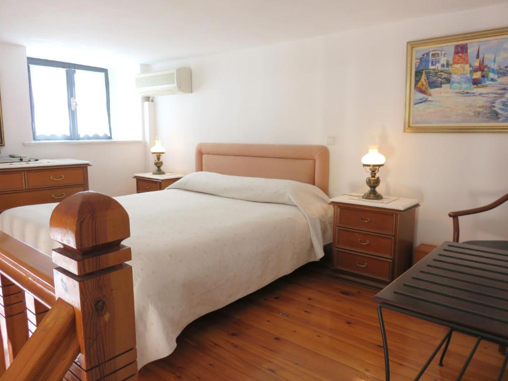 Postel nebo postele na pokoji v ubytování Phaedra Hotel