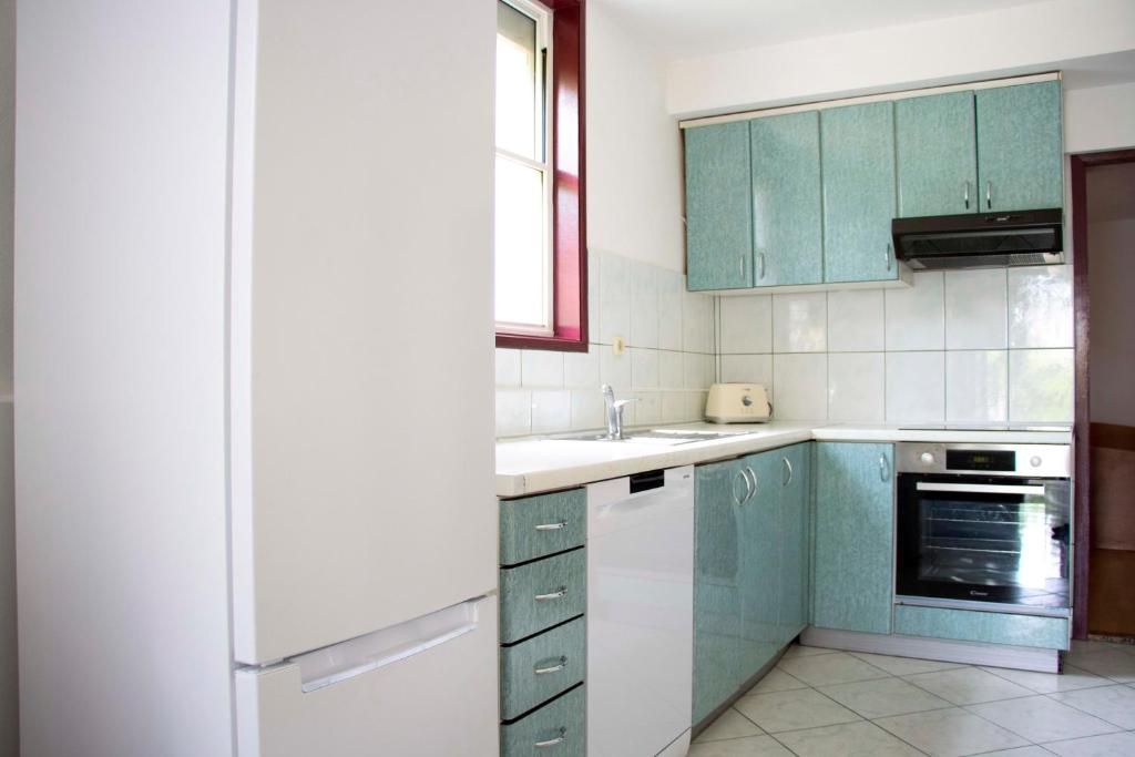 Kuchyňa alebo kuchynka v ubytovaní Pepi Apartments 1