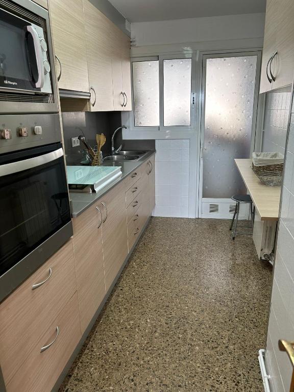 Kuchyň nebo kuchyňský kout v ubytování Apartamento Vacacional en Platja D'Aro