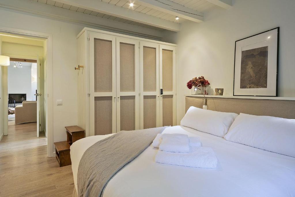 Posteľ alebo postele v izbe v ubytovaní Luderna - Apartamento con terraza Orri A8