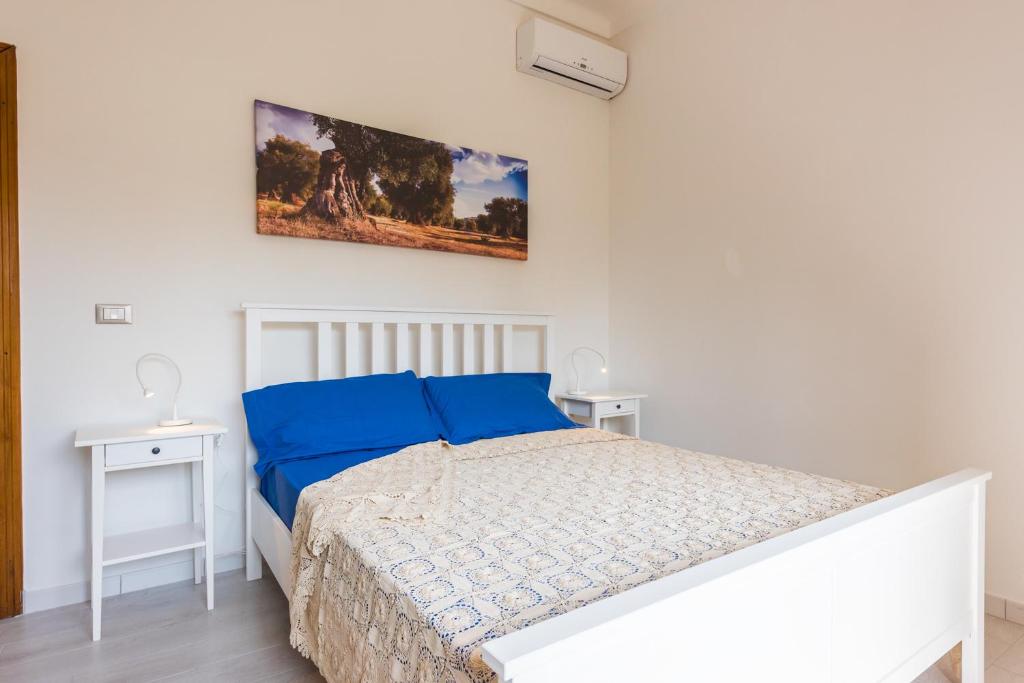 A bed or beds in a room at Mare Relax
