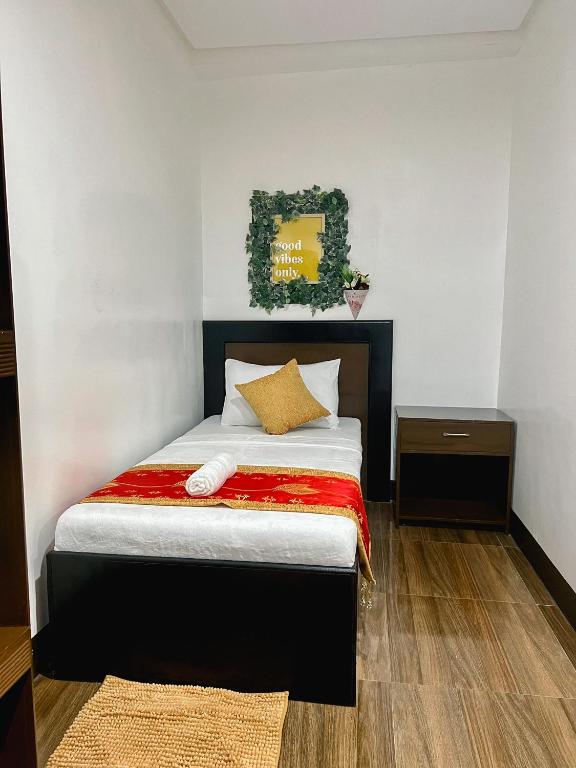 Postel nebo postele na pokoji v ubytování Island Wanderers Inn