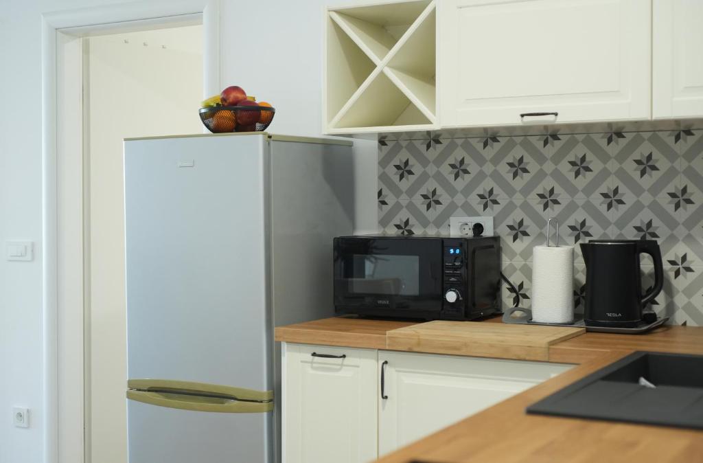 Kuchyň nebo kuchyňský kout v ubytování Apartments Petrich