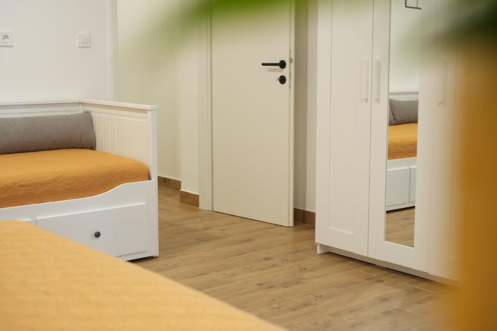 Postel nebo postele na pokoji v ubytování Apartments Petrich