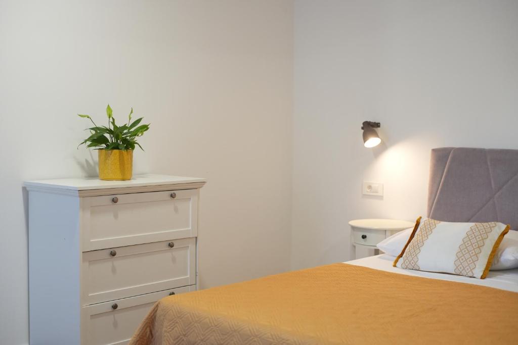 Postel nebo postele na pokoji v ubytování Apartments Petrich