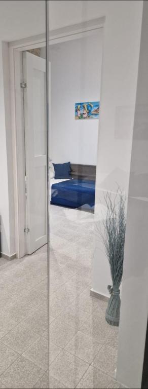 Postel nebo postele na pokoji v ubytování Miramare rooms b&b