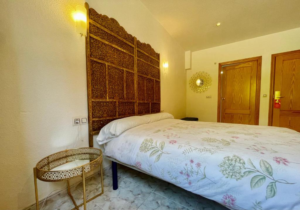A bed or beds in a room at CHINASOL Low Cost