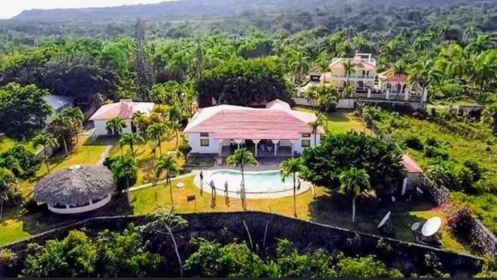 an aerial view of a house with a pool at Ocean Breeze Villa Carismar in Cabrera