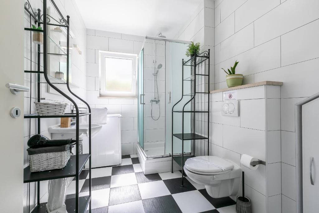 Koupelna v ubytování Apartments Karisima
