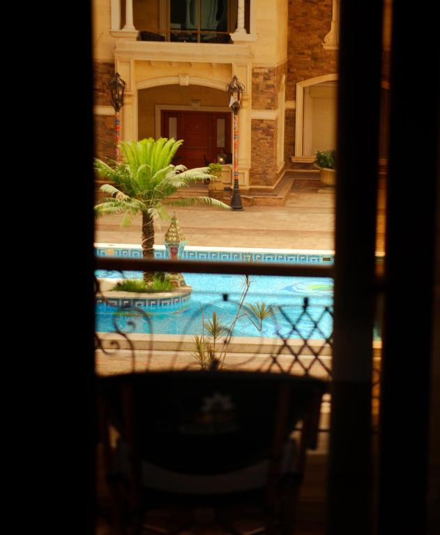 Bazén v ubytování Jasmine Pyramids Hotel nebo v jeho okolí