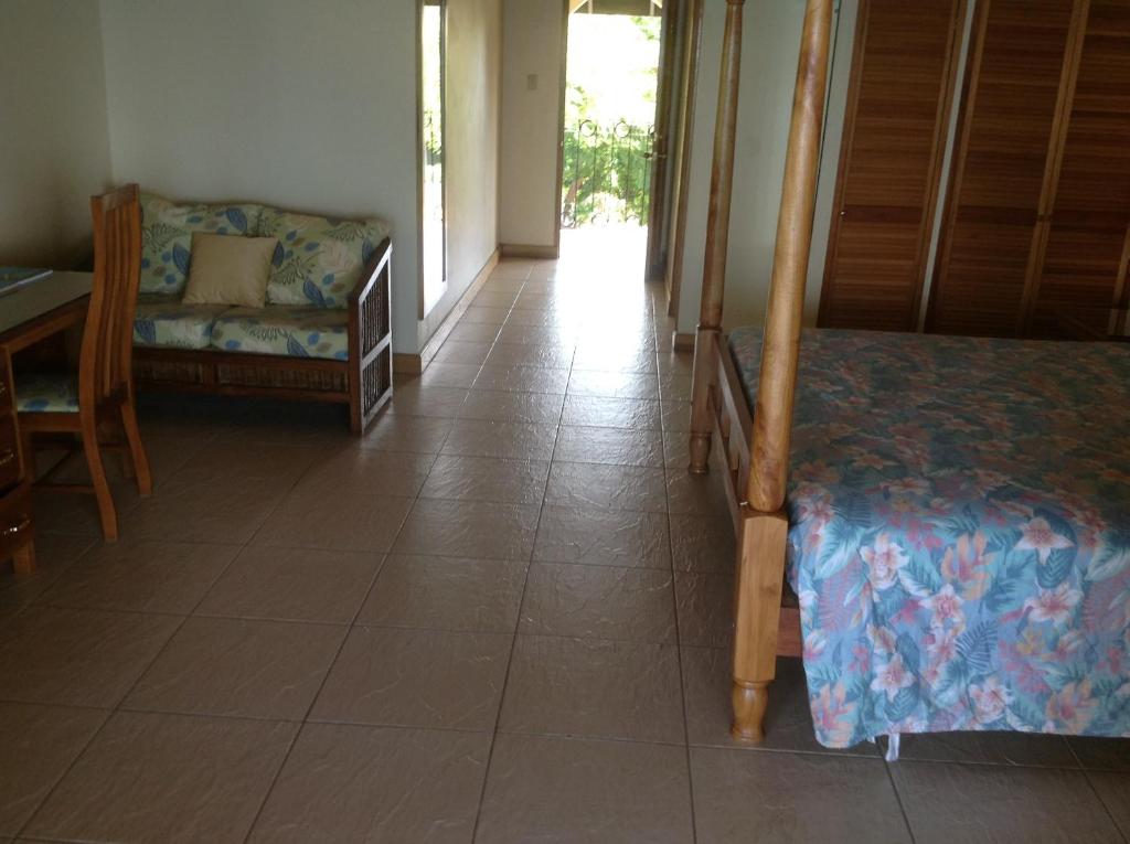 Postel nebo postele na pokoji v ubytování Le Mirage