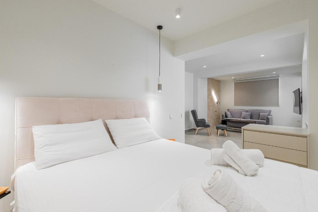 En eller flere senge i et værelse på Gemela AllstarBoutique in Aegina A