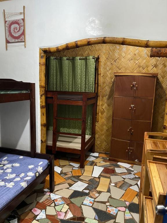 Letto o letti in una camera di Bamboo Nest
