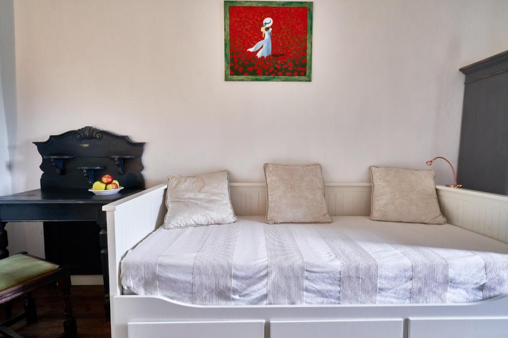 Łóżko lub łóżka w pokoju w obiekcie Maison BOGArT