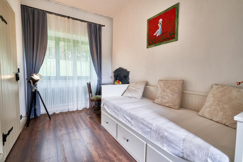 Łóżko lub łóżka w pokoju w obiekcie Maison BOGArT