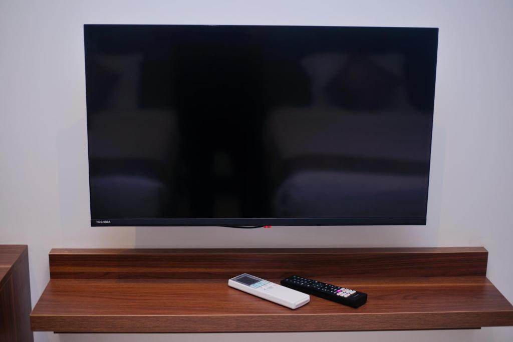 TV a/nebo společenská místnost v ubytování Jasmine Pyramids Hotel