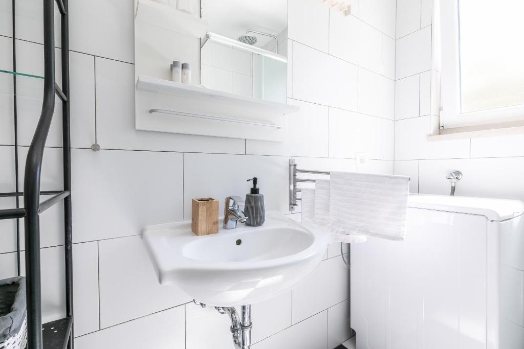 Koupelna v ubytování Apartments Karisima