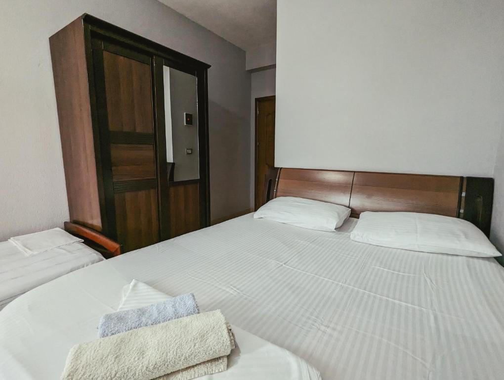 Postel nebo postele na pokoji v ubytování Vila Vadeha
