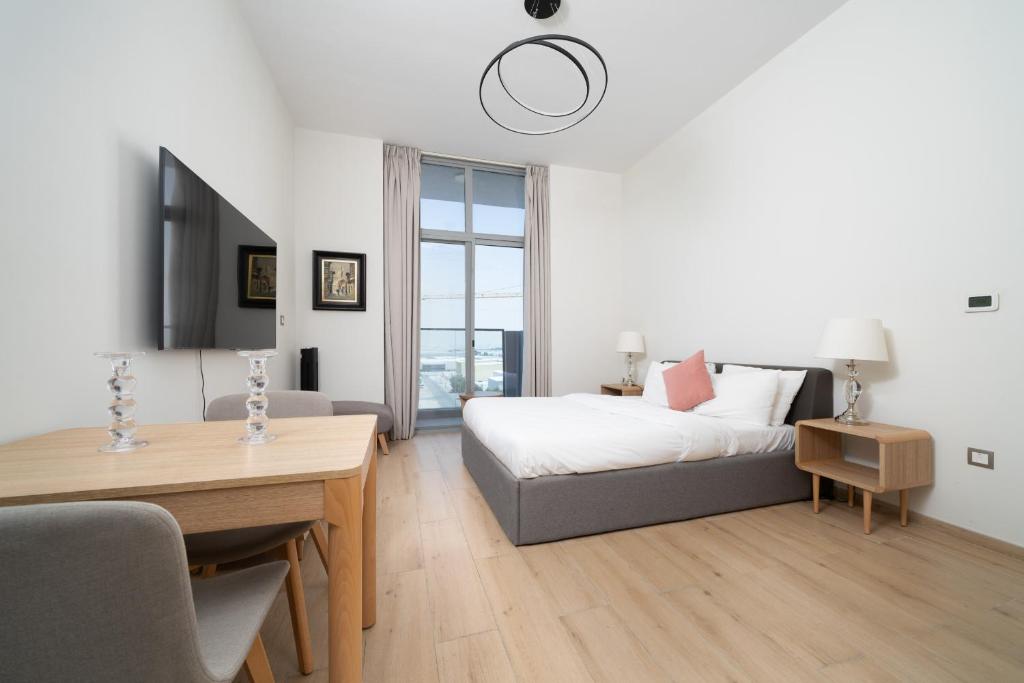 ALH Vacay – Studio near UAE Exchange Metro Station