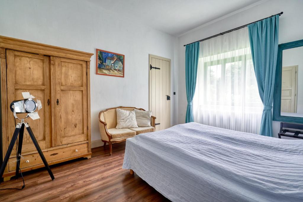 Łóżko lub łóżka w pokoju w obiekcie Maison BOGArT