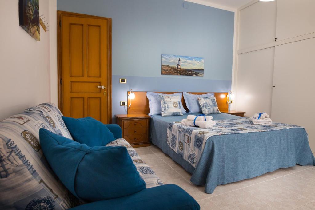 Postel nebo postele na pokoji v ubytování B&B Lucia