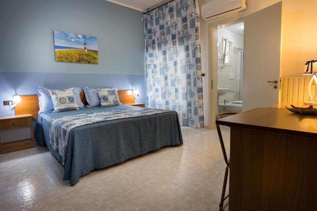 Postel nebo postele na pokoji v ubytování B&B Lucia