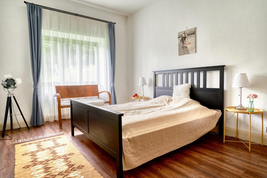 Łóżko lub łóżka w pokoju w obiekcie Maison BOGArT