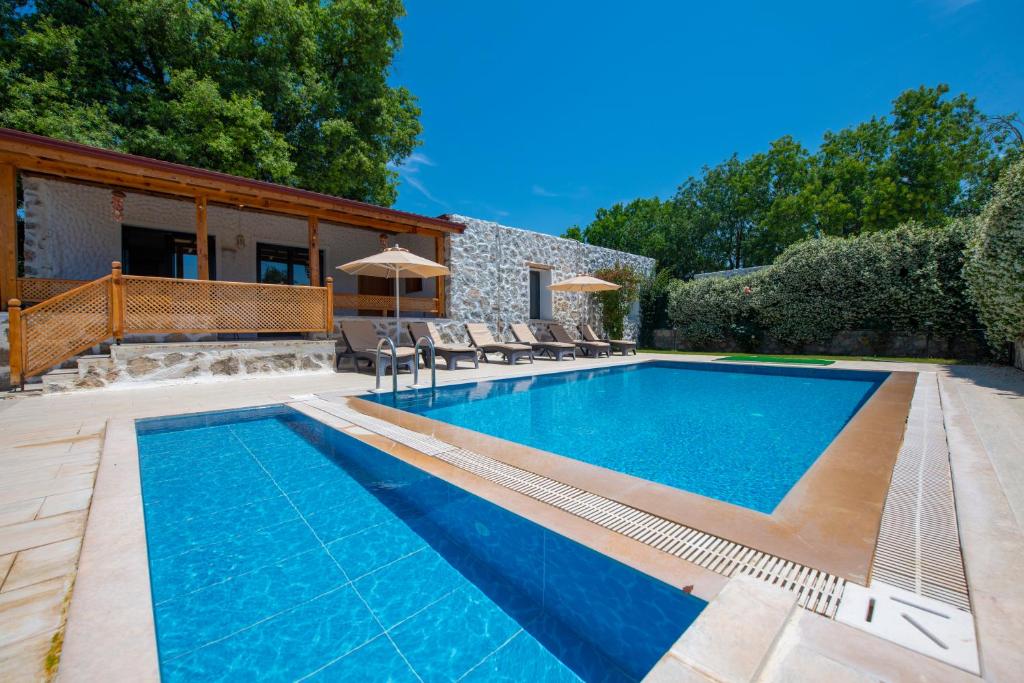 Fotografie z fotogalerie ubytování Eroğlu Villas v destinaci Fethiye
