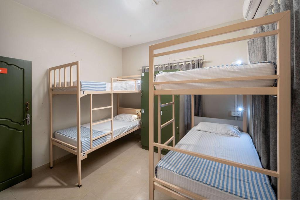 Postel nebo postele na pokoji v ubytování Zostel Kochi, Fort Kochi