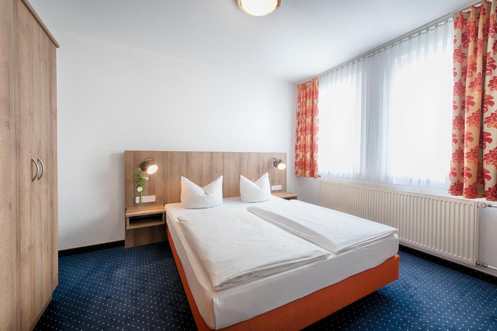 Postel nebo postele na pokoji v ubytování ACHAT Hotel Dresden Altstadt