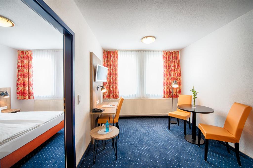 Postel nebo postele na pokoji v ubytování ACHAT Hotel Dresden Altstadt
