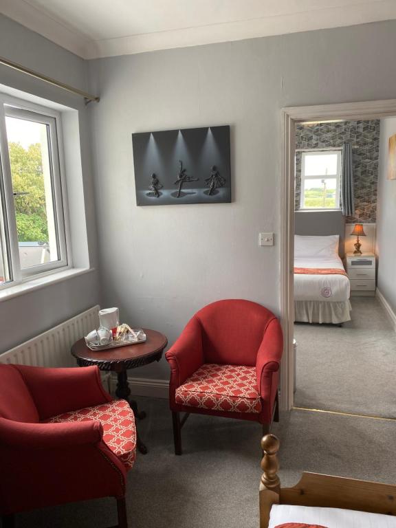 Postel nebo postele na pokoji v ubytování Clonmore Lodge B&B