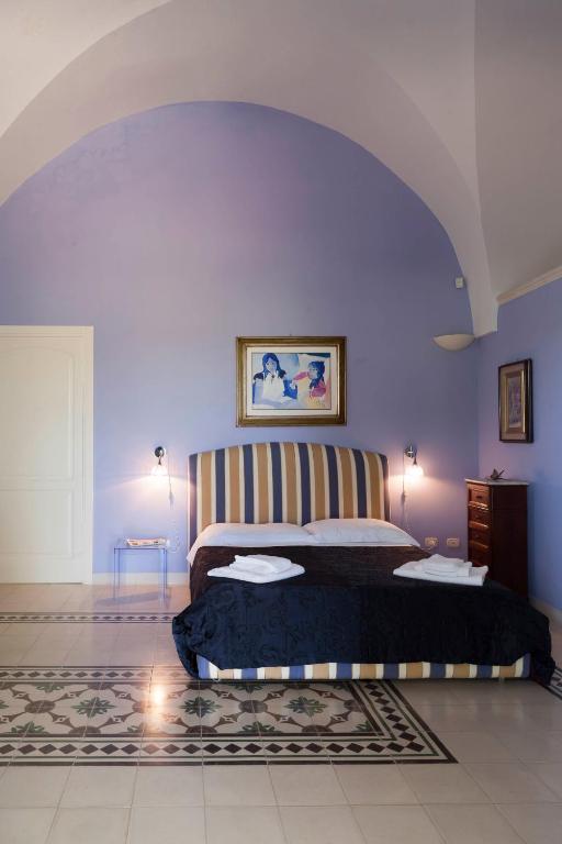Postel nebo postele na pokoji v ubytování Villa Urso bed&breakfast