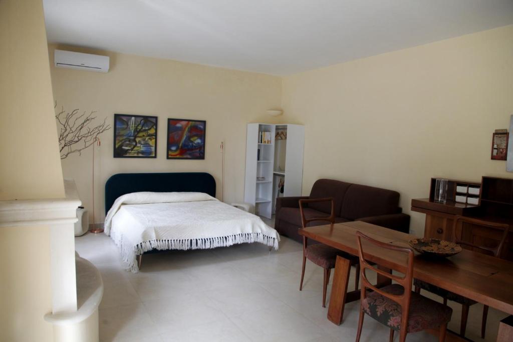 Postel nebo postele na pokoji v ubytování Villa Urso bed&breakfast