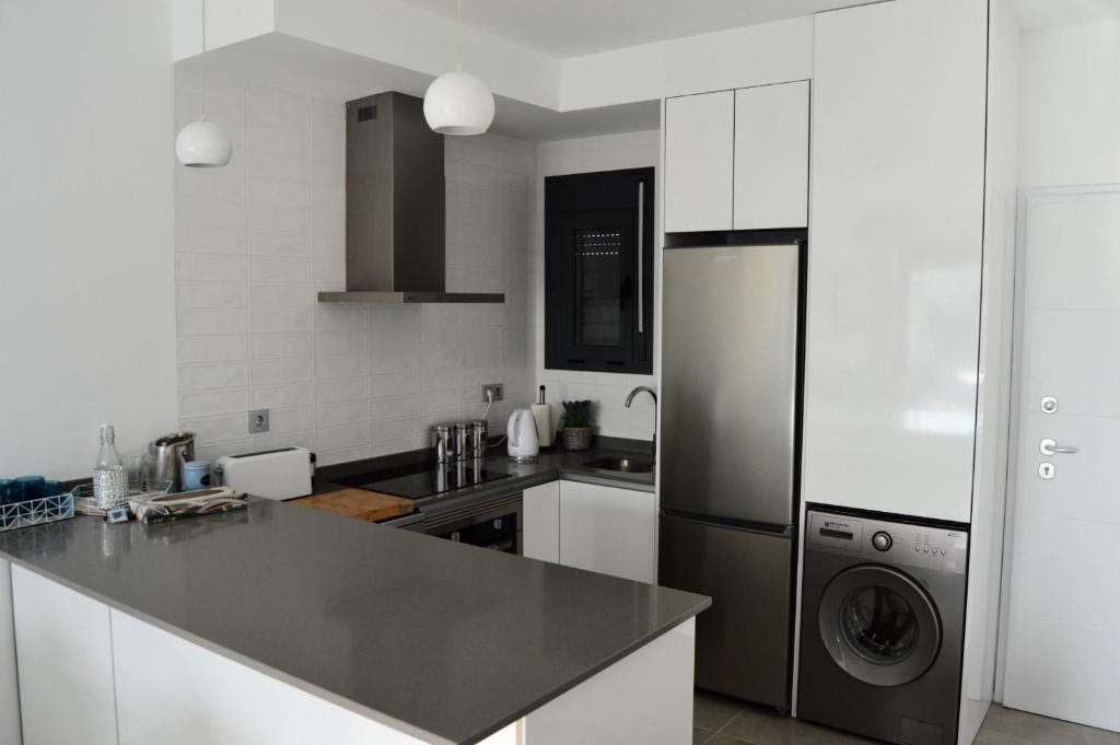 Kuchyň nebo kuchyňský kout v ubytování Apt with Roof Terrace Pilar De La Horadada