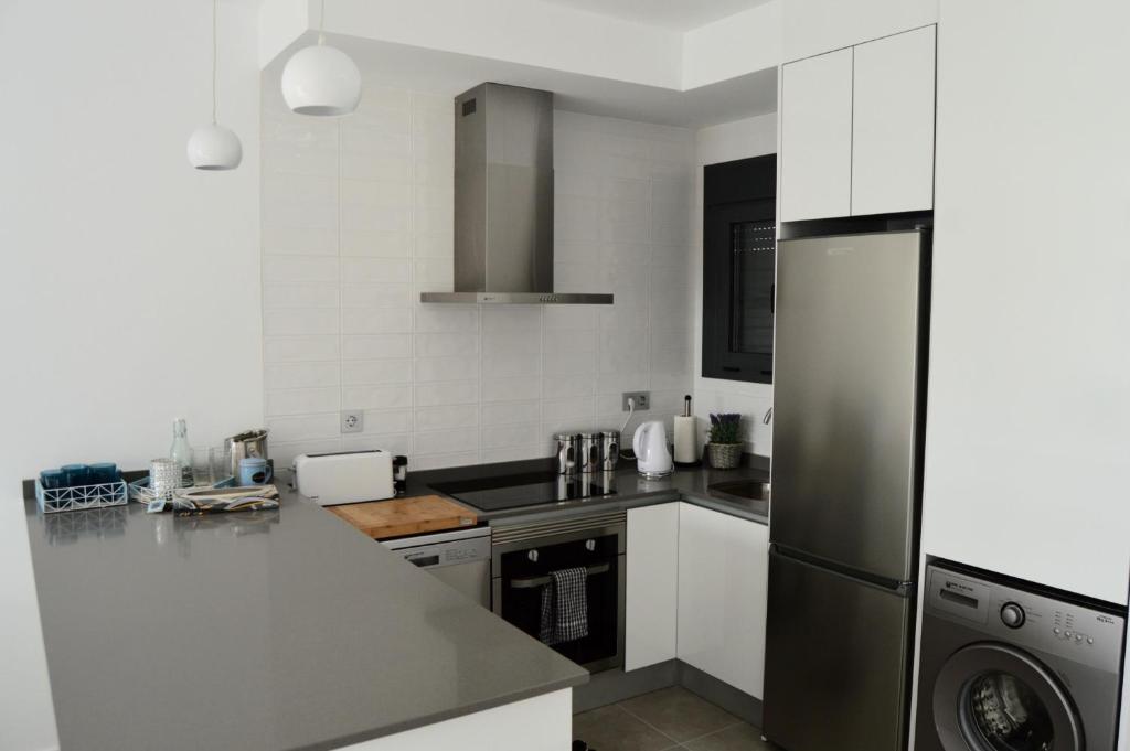 Kuchyň nebo kuchyňský kout v ubytování Apt with Roof Terrace Pilar De La Horadada