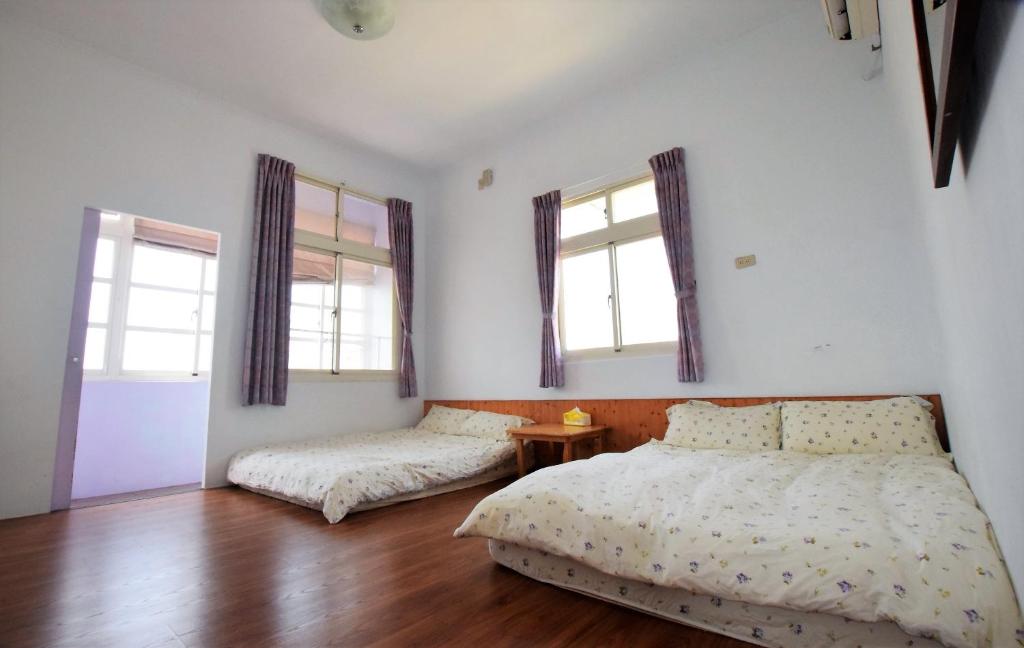 Postel nebo postele na pokoji v ubytování Caramel Macchiato Homestay
