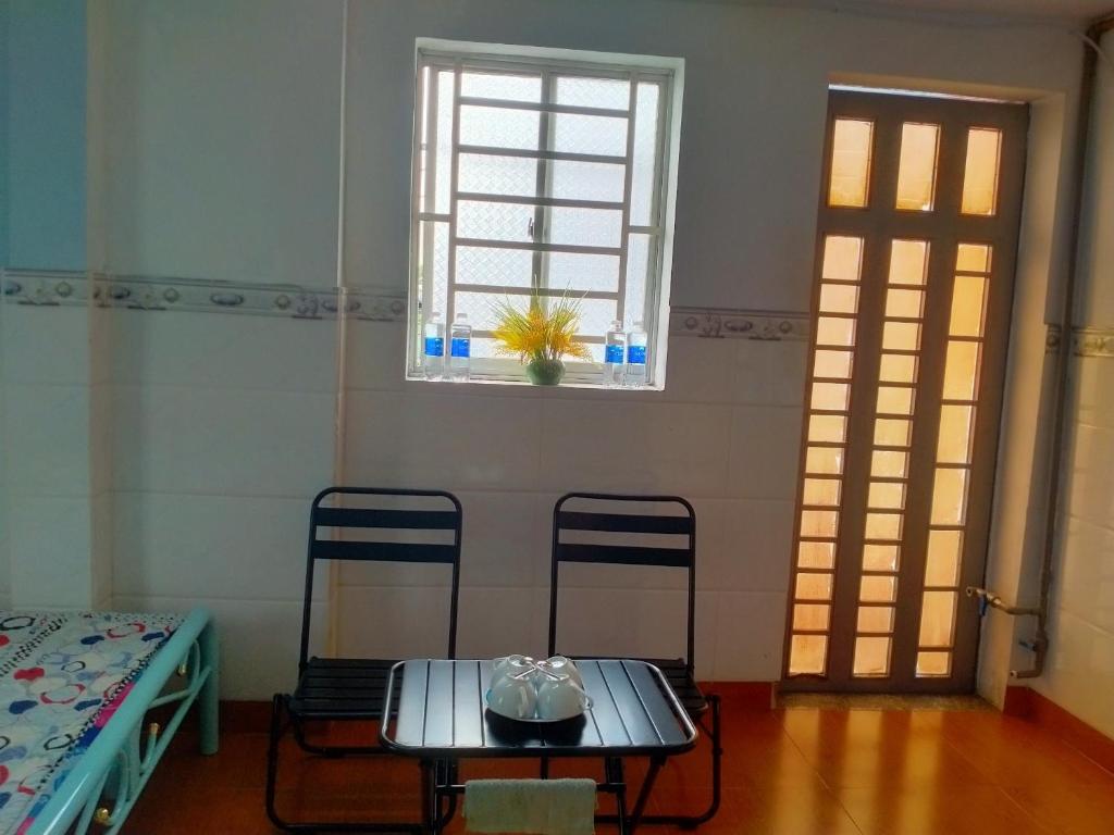 Ένα ή περισσότερα κρεβάτια σε δωμάτιο στο VACATION CHOICE in Vietnam 3