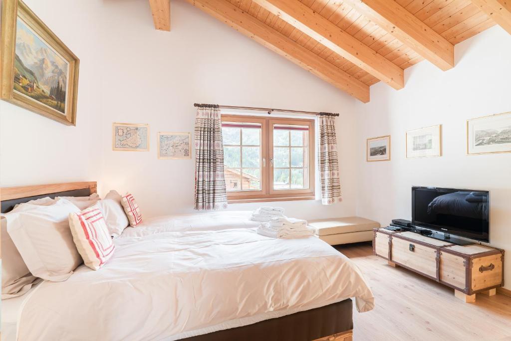 Postel nebo postele na pokoji v ubytování Chalet Ulysse