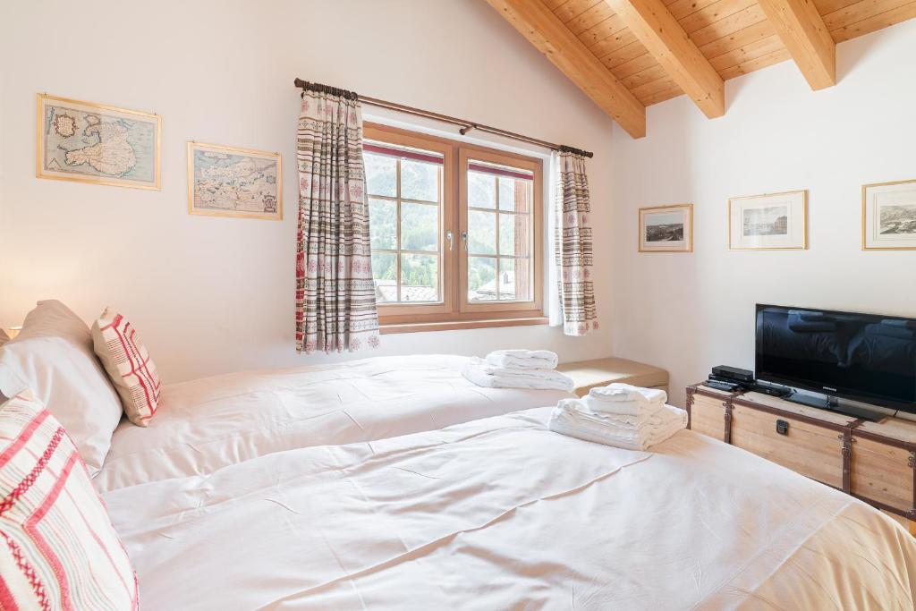 Postel nebo postele na pokoji v ubytování Chalet Ulysse