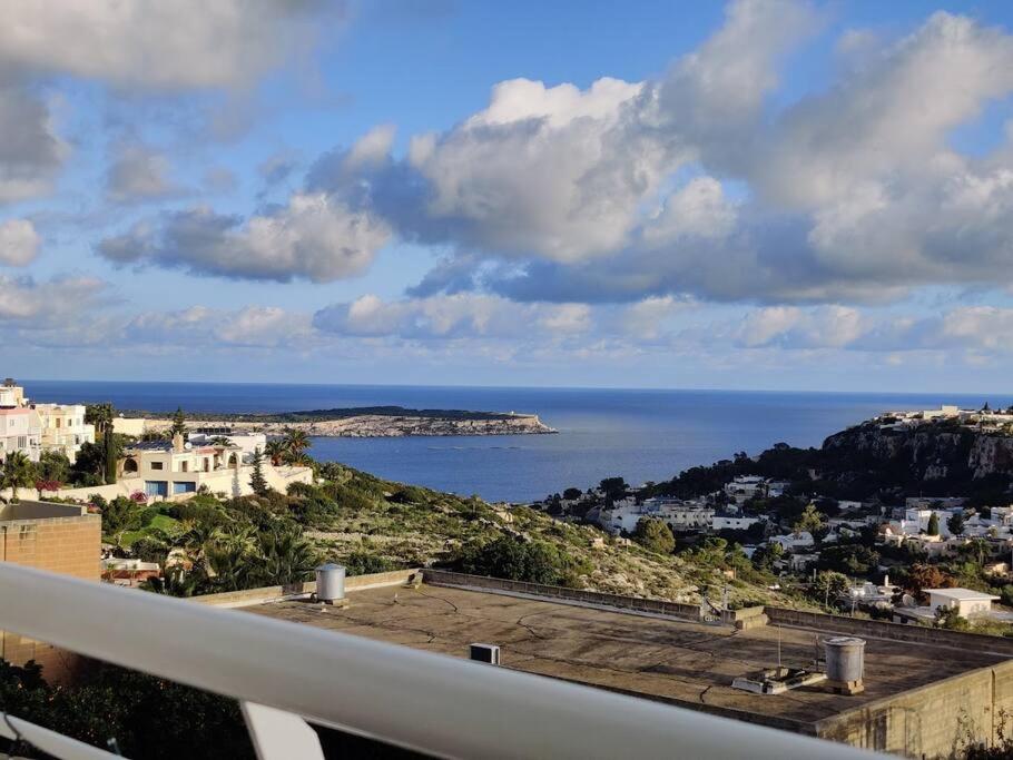 a view of the ocean from a balcony at Luxury Seaview Mellieha Apartment in Mellieħa