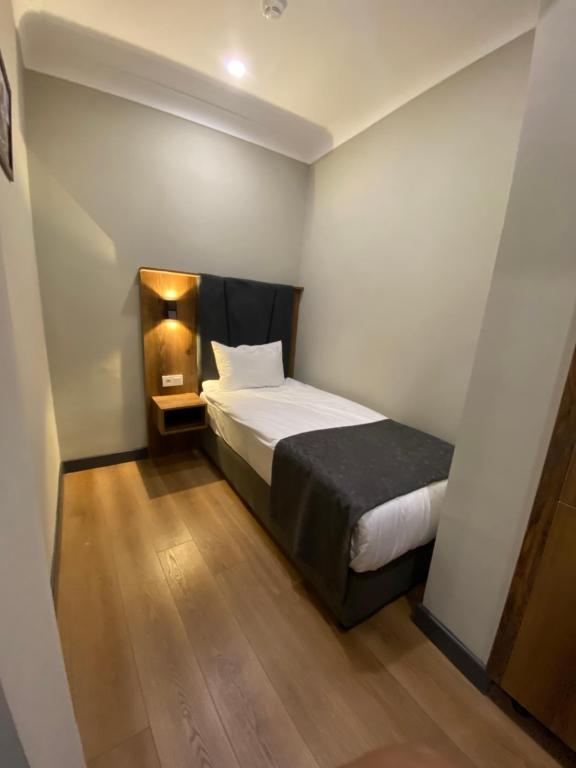 Postel nebo postele na pokoji v ubytování Zeyn Otel Istanbul