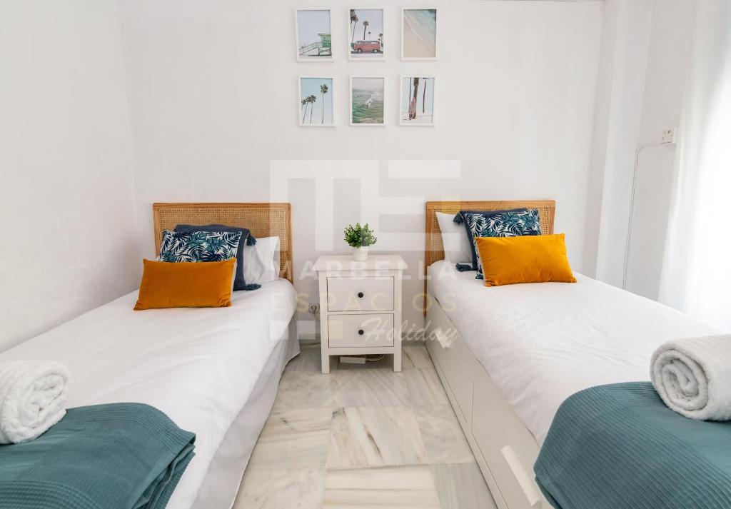 Postel nebo postele na pokoji v ubytování Marbella House 46 Duplex