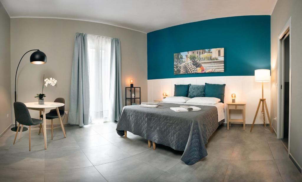 Postel nebo postele na pokoji v ubytování B&B La Pigna