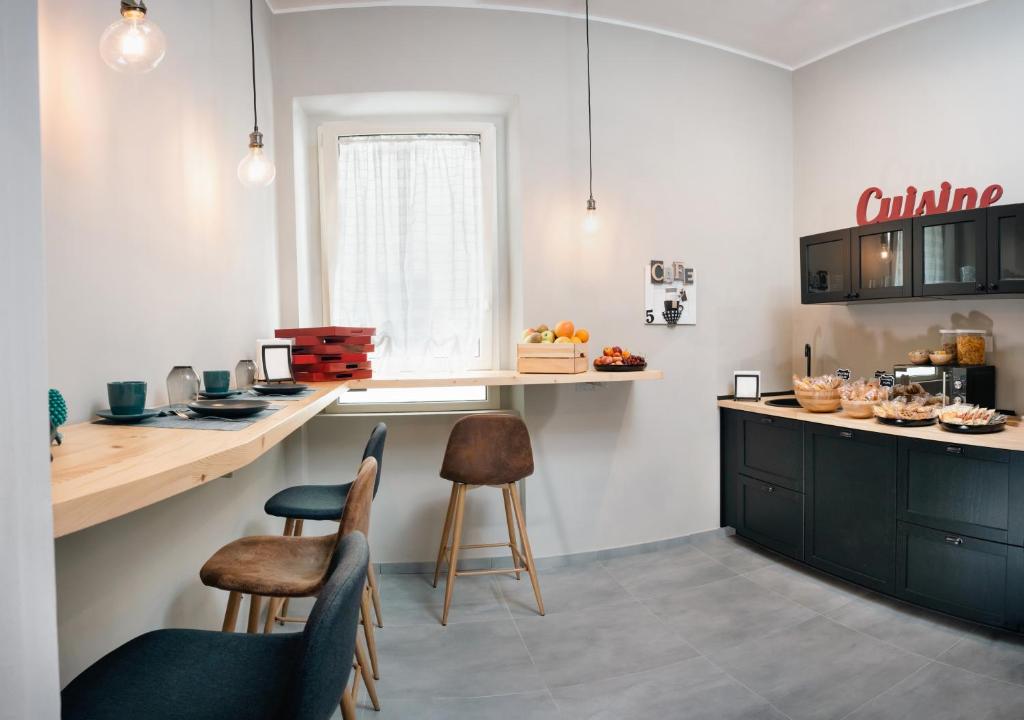 Kuchyň nebo kuchyňský kout v ubytování B&B La Pigna